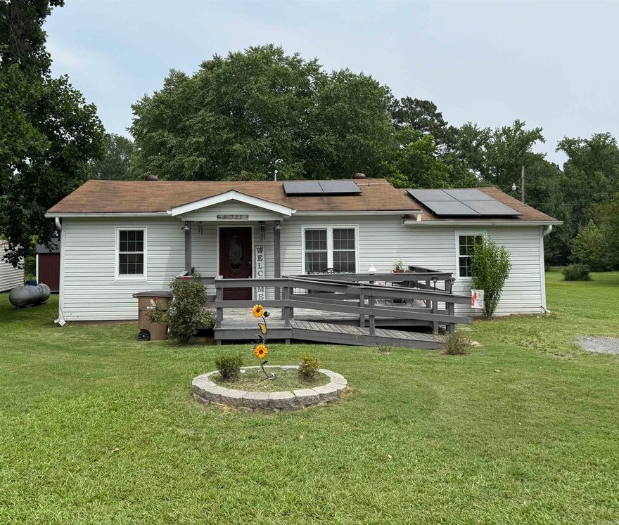 3 Bedroom/2 bath home on a 1/2 acre.  Split floor plan.  Nice updated kitchen with granite countertops and a breakfast bar.  Large den that opens to a large deck. Large, spacious backyard. Master bath has an updated walk-in shower. Schedule a showing today to see this property.