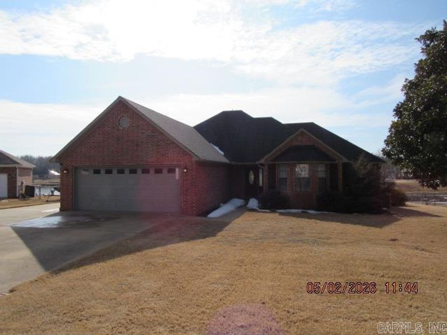 Well-maintained 3-bedroom home offering lake frontage on the Lake Wilhelmina that ultimately connects to Lake Conway! You will love the open floor plan taking full advantage of the view! Laminate flooring throughout the main areas, floor to ceiling rock fireplace, 2-inch blinds throughout, granite countertops throughout, stainless appliances including refrigerator, separate laundry room with hook-ups, spacious primary suite with separate tub & shower, large covered & open decks offering outside entertaining, and the list goes on! No Pets Allowed! ***PLEASE NOTE WE DO NOT ADVERTISE ON CRAIGSLIST OR FACEBOOK MARKETPLACE. ANY LISTING OF OURS SEEN IS A SCAM!!!***