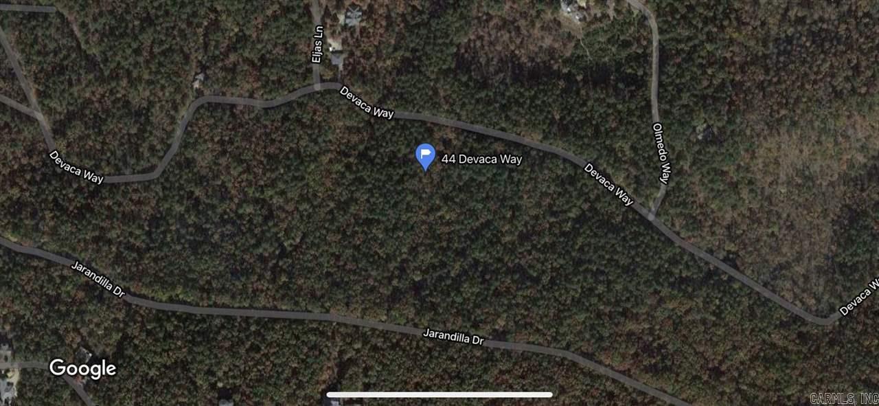 3.74 acre lot in the Olmeda subdivision with mountain views surrounded by nature and trees providing privacy. A great opportunity to build your dream home in Hot Springs Village. Located right off of a paved road and close to the golf course.