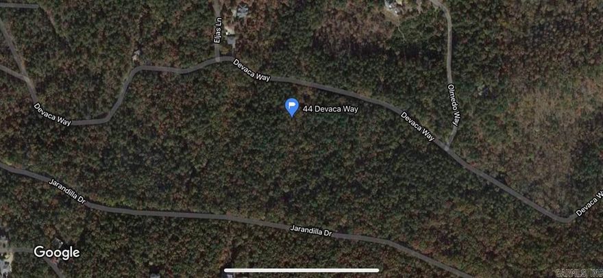 3.74 acre lot in the Olmeda subdivision with mountain views surrounded by nature and trees providing privacy. A great opportunity to build your dream home in Hot Springs Village. Located right off of a paved road and close to the golf course.