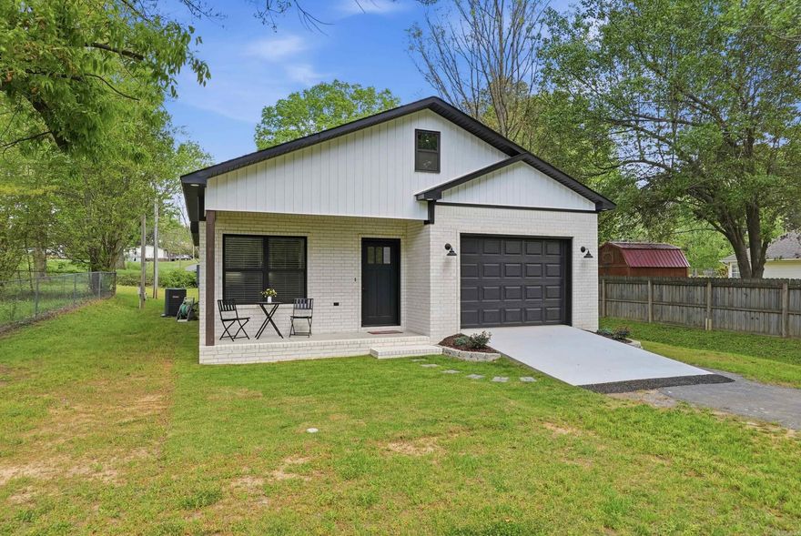 Welcome to 6 7th Street in Greenbrier, Arkansas, a rare opportunity to own the least expensive new construction home currently on the market in Greenbrier AR. Home buyers searching for affordable new homes in Greenbrier AR will appreciate the modern design, efficient layout, and convenient location within an established neighborhood. This immaculate 3 bedroom, 2 bathroom home offers a thoughtfully designed open floor plan that maximizes both comfort and functionality. Each bedroom features generous walk-in closets, providing ample storage, while the kitchen includes a full walk-in pantry and abundant cabinet space, making organization simple & practical. Every square foot of this home has been carefully planned for easy everyday living. Enjoy the charm of small-town living located just minutes to top rated Greenbrier schools, park, shopping, and dining. All public utilities are connected, ensuring true move-in readiness, and a new wood privacy fence in the backyard will soon enhance outdoor enjoyment. This home stands out as an incredible value for buyers seeking quality new construction at an affordable price. Schedule your private showing today and see why this home stands out