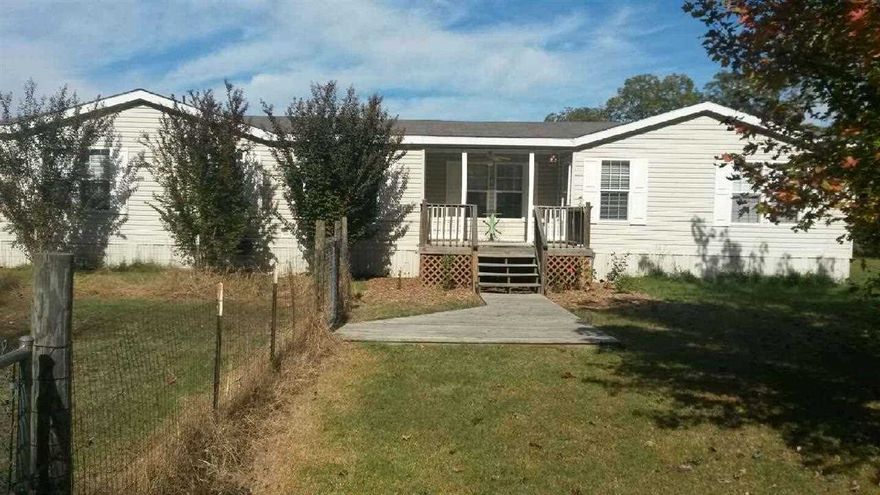 Very secluded off Highway 157, this IMMACULATE home has separate Dining Room, split bedroom floor plan .  Large MBA with separate garden tub/shower and big walk in closet.   Family Room has a wood burning fireplace and room for a big sectional!  Kitchen has built in wall oven and microwave.  Large Kitchen island, big picture window to view the outdoors.  Open hallway to other two bedrooms has room for a small office area. Fenced yard.  R/V hookup with elec/water/septic! Priced under appraisal.