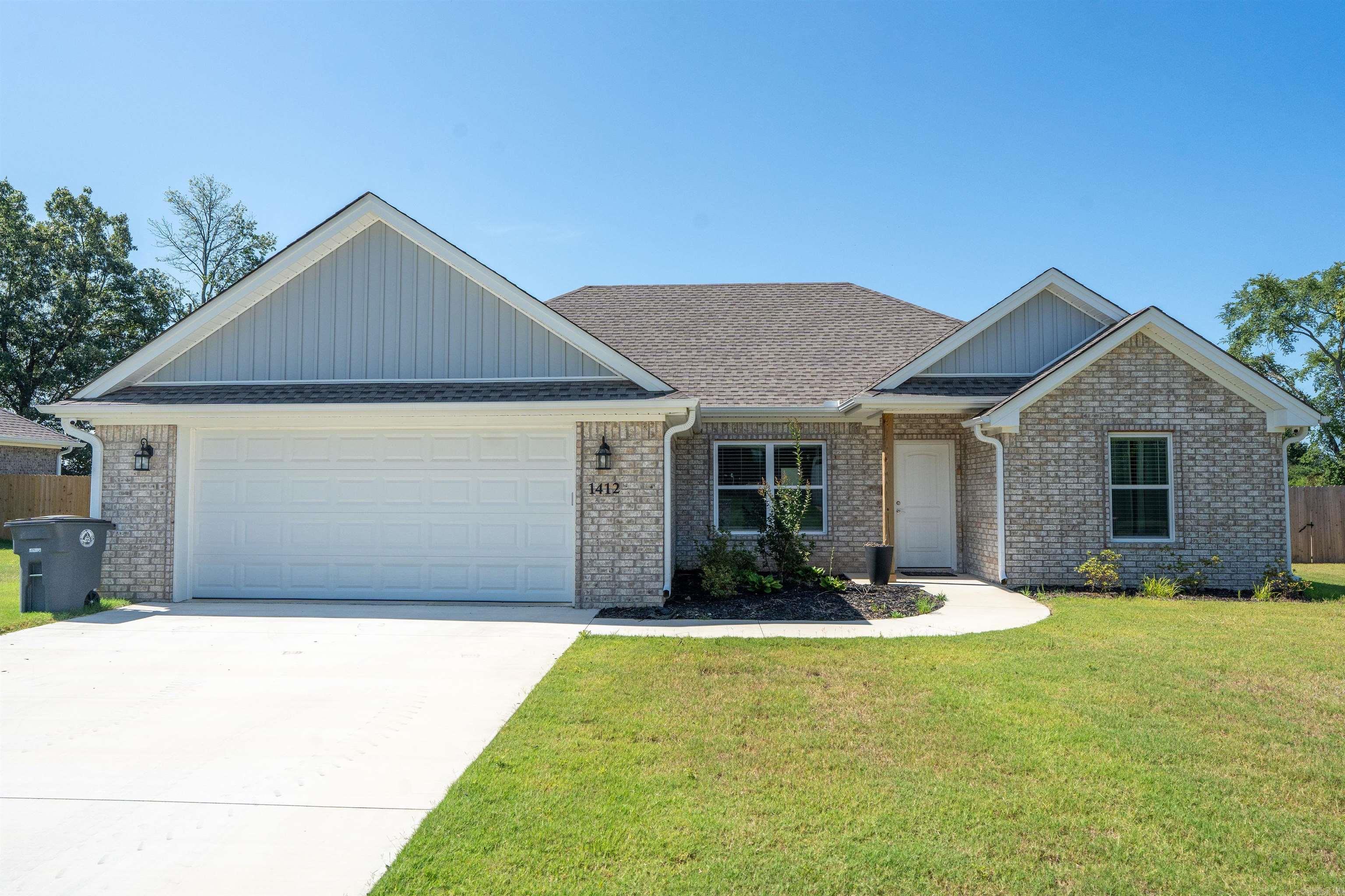 Modern Comfort Meets Style in this lovely 3/2 2024 built home. This home features a well-designed split floor plan, perfect for privacy and functionality. The heart of the home is a spacious kitchen, where a large center island anchors the open-concept living and dining areas. Recessed lighting brightens the entire space creating a clean and modern ambiance. The kitchen is sleek with its granite countertops, luxury vinyl flooring and inviting color palette that flows through out the home. Additional features include new window coverings; a convenient charging station/drop zone near the garage entry; fully sodded yard and a smart home security system. This home blends smart design with cozy elegance - ready for you to move in and make it your own. agents view remarks