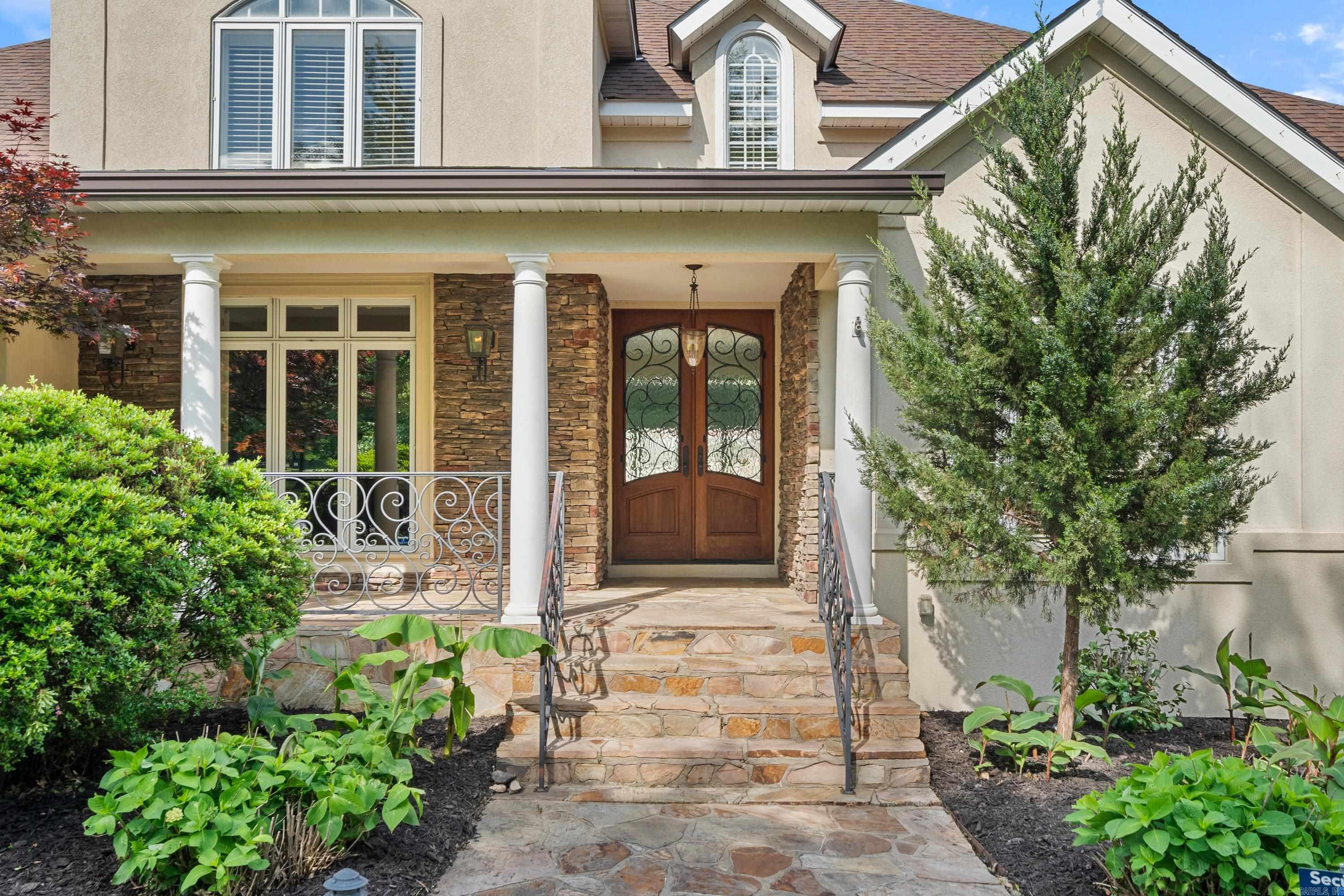 Grand and custom home w/ a detached pool house on a 1-acre corner lot located in the beautiful East Gate II neighborhood. Chef’s kitchen w/ subzero refrigerator, wolf range, pewter island, quartz counters, butlers pantry, soft-closing cabinets and drawers, and a built in Miele coffee/espresso machine.  Key features include a large mud room, tile throughout, 3 car garage, round about driveway, in-ground pool, chefs outdoor grill w/ refrigerator, a steam sauna in pool house,  and a large gated side yard that gets ample sunlight. Whole house Generator for your peace of mind. This home offers a luxurious lifestyle with modern amenities in a sought after location all while being close enough to nature to experience all the outdoor adventures.  Additionally, home includes Generac generator, wired security system and cameras, built in speaker system (interior & exterior), and 3 professionally installed TVs.  Lakeside School district. 1 mile from country club and a few miles from Downtown, many hiking trails, Lake  Hamilton, and Garvan Gardens.  Move-in ready. 5th bedroom and 4th bath are pool house and not included in square footage. Pool house is 497 sq. feet mol.