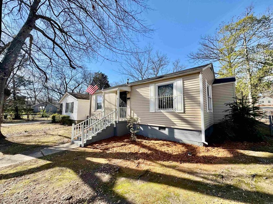 Welcome to this great 3 bedroom 1 bath home on a corner lot conveniently located. It features hardwood floors, updated paint, updated counter tops including a butcher block bar. The home has a carport, 2 living rooms with built ins. Being on a corner lot also gives this home a great sized backyard!