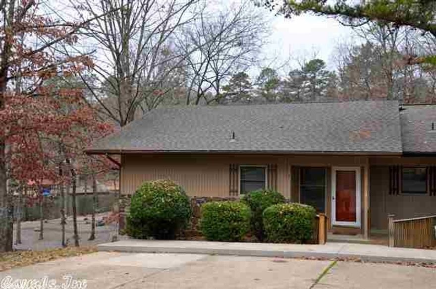 $2500 TOWARDS BUYER'S CLOSING COSTS PAID!  VIEWS OF  LAKE DESOTO SKI LAKE! CONVENIENTLY LOCATED NEAR WEST GATE FOR SHOPPING AND ACTIVITIES! LAKE VIEWS FROM 2 DECKS, SMALL DOCK ACCESS FOR FISHING, PADDLE BOATS, ETC!  FRESHLY PAINTED INTERIOR AND EXTERIOR! 1 YR HOME WARRANTY! 3 BR/2 BA WITH MASTER AND BATH ON MAIN LEVEL AND 2 SPACIOUS GUEST BEDROOMS ON THE LOWER LEVEL! BRAND NEW HARDWOOD FLOORING ON MAIN LEVEL! LARGE STORAGE ROOM ON LOWER LEVEL. PERFECT FOR VACATION OR FULL TIME LIVING! ALL CONTENTS CONVEY!