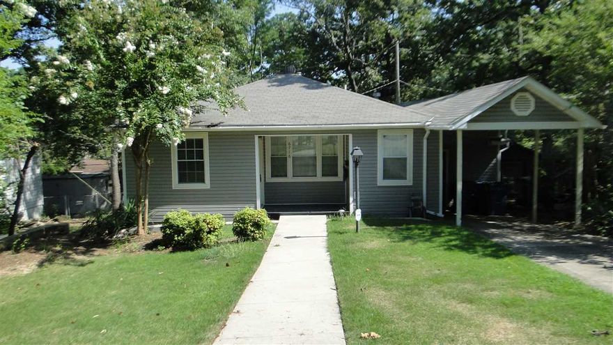 Updated home in a desirable neighborhood.  The home features hardwood flooring and newly painted walls. The kitchen is equipped with stainless steel appliances that include refrigerator, gas stove and dishwasher. The large master bedroom has a huge closet with custom built-in's and laundry that includes the washer and dryer.  Other amenities includes: covered parking, outdoor storage, and a nice deck overlooking fenced backyard.