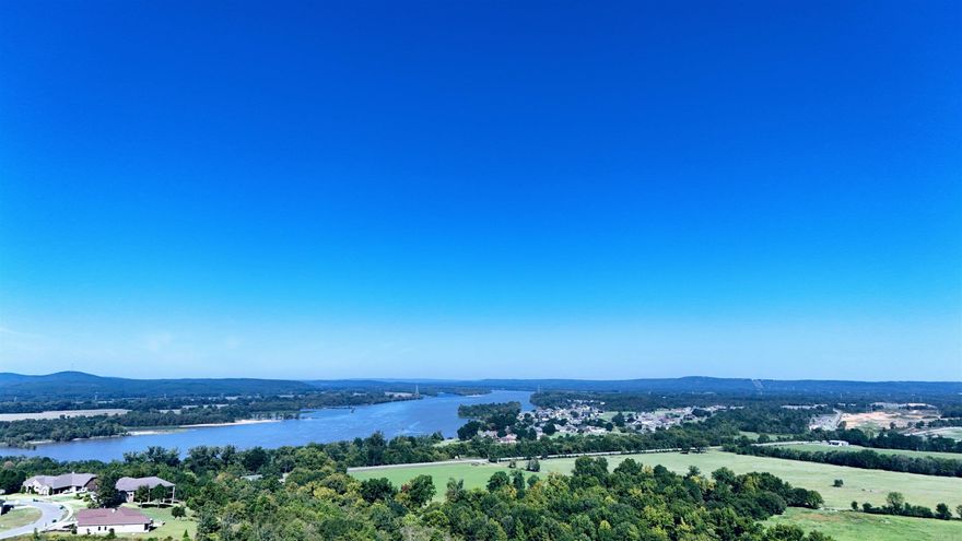One of Maumelle's most sought after Gated Communities! Great opportunity to purchase this one acre lot in the newest phase with an amazing view of the Ar River and mountain ranges! Spectacular views to include Breathtaking Sunsets!! Click unbranded video to see a slide show. This neighborhood has some of the most impressive views in Arkansas. Have you always wanted to design your own home, but also wanted a view!  Let me help you make that dream a reality! Call today for a tour of the area! Underground utilities to include; water, electricity, gas, sewer and high speed ATT internet! Minimum sq ft requirements are 2500 sq ft.  Gates are open on Sat and Sun from 2-4. You're always welcome!