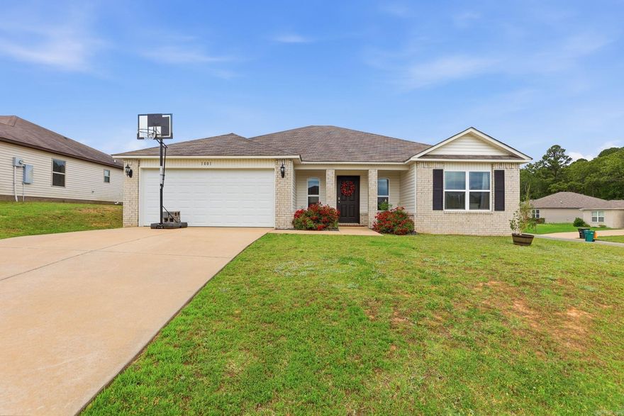 Welcome Home!! This well-maintained 4-bedroom, 2-bathroom home situated on a spacious corner lot is a must see. The open-concept layout easily accommodates everyday living, connecting the main living space to a functional kitchen complete with a breakfast bar, dining nook, and a roomy laundry area. Outside, the generous corner lot provides a two-car garage, a rear patio, and a large, versatile backyard. The neighborhood if located directly across from the local high school, and the home offers an incredibly convenient commute to the Air Force Base, Camp Robinson, local shopping, and major access roads.
