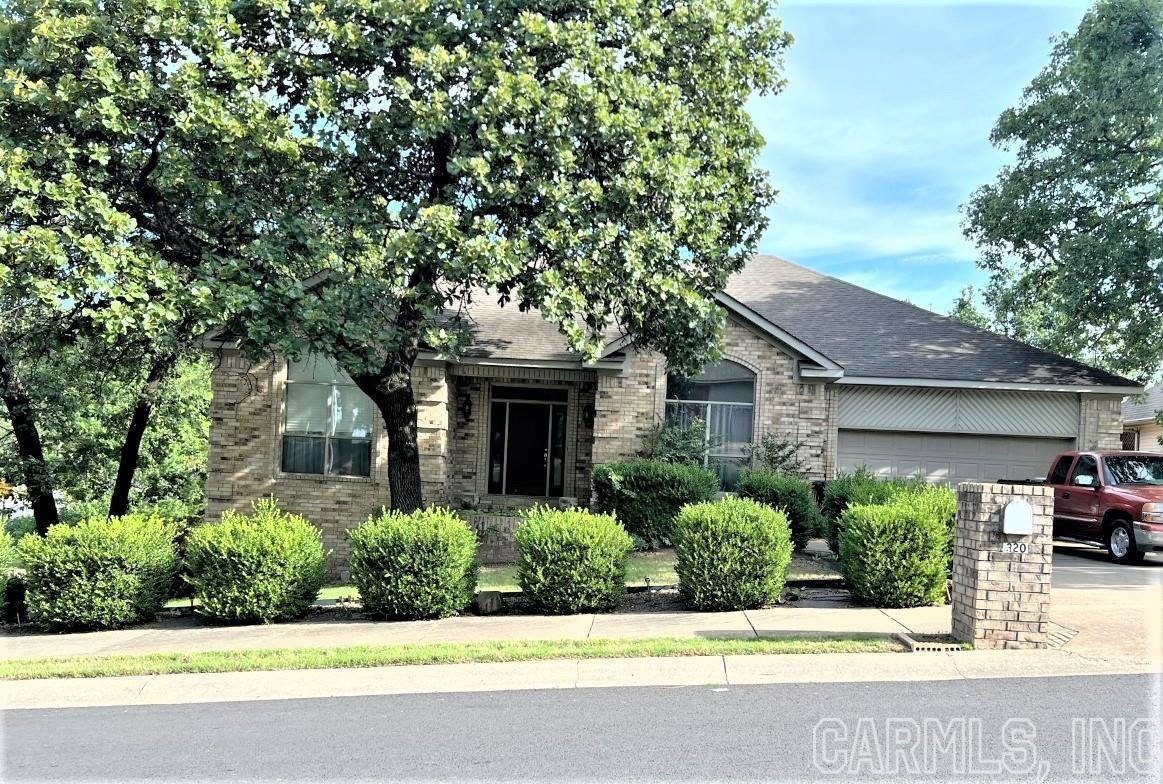 Beautiful home in the sought after Sherwood area! This one won't last long. This lovely home has everthing to accommodate a large family. Top floor open floor plan with a fireplace in the formal living room. Bottom floor has two bedrooms and an exercise room. Talk about storage don't ask because their is plenty of it. A must see!!!!!!