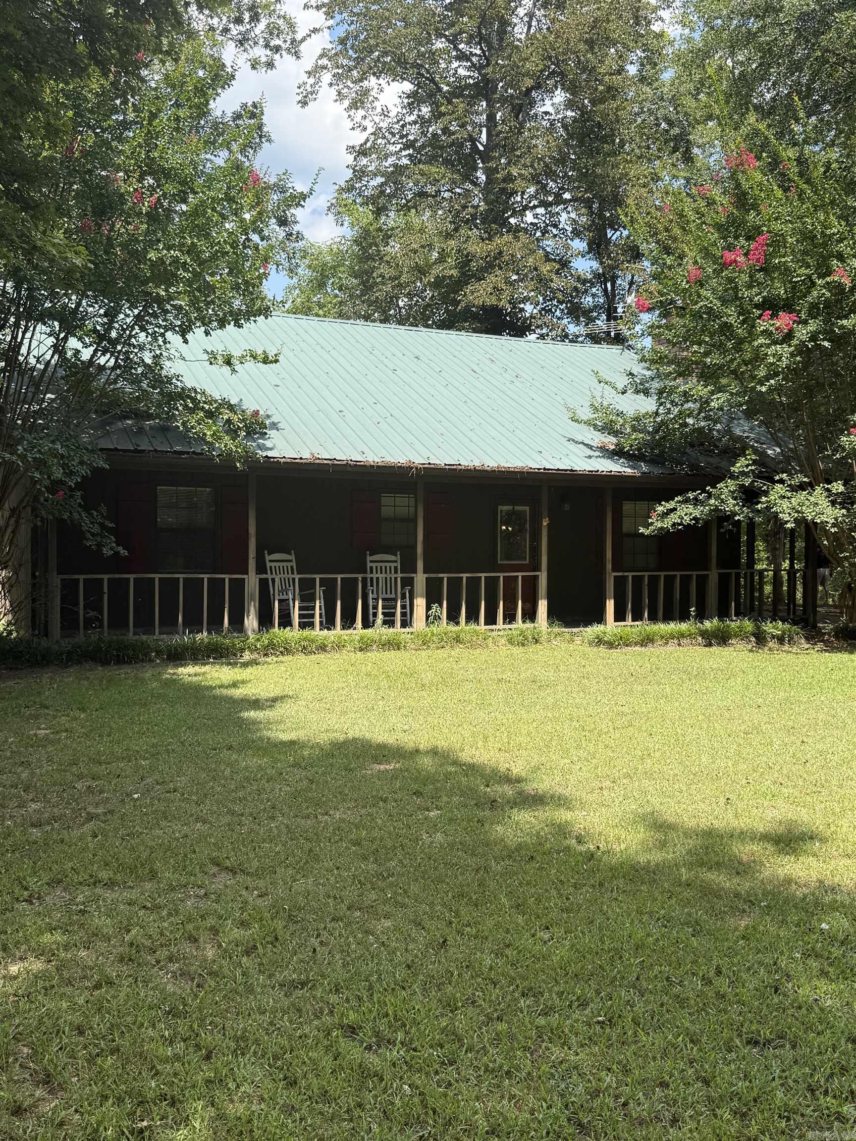 If you are looking for a very private get a way look no further.! Amazing views and breathtaking scenery from this Riverfront cabin. See the Eagles soar and the wildlife out on the deck while enjoying this piece of serenity. If you enjoy fishing the trout fishing will be your new hobby! Extensive rock work and landscaping. Completely remodeled in 09. Open floor plan, Cypress cabinetry with Corian counter tops. Gas log fireplace. Outside storage building.