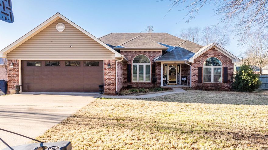 Welcome to 420 Honeysuckle Lane, a beautifully updated home that perfectly blends comfort with modern elegance. Available for sale, this property offers an inviting space for everyone.  Inside, you'll find a generous living area of 1,873 square feet that has been thoughtfully renovated. The kitchen, boasting new countertops and new backsplash. Natural light enhances the entire house through brand new insulated windows, making the space warm and appealing while promoting energy efficiency. All new roof as well!  Bathrooms have been updated, including a new stand-alone tub in the master bath for ultimate relaxation. New flooring throughout adds to the home's fresh appeal.  This property also features a large fenced in backyard and a shed.   420 Honeysuckle Lane is an exceptional choice for those seeking a move-in-ready home right in the middle of town. Embrace the opportunity to make this house your next home.