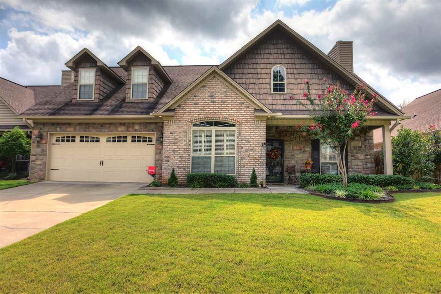 Good as new with solid surface countertops and stained cabinets. Great kitchen with tons of cabinet space and counterspace AND a pantry.  Sunroom too!  Nice deck, sprinkler system, no yard work...all done by POA.  Gated subdivision.