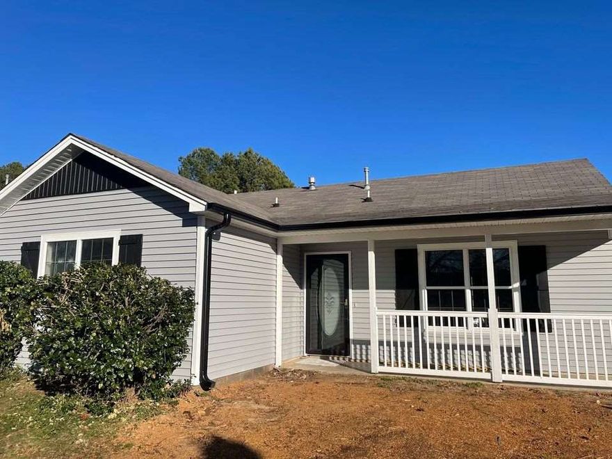 Freshly remodeled & conveniently located in the middle of town.Tons of updates and features include: New exterior and interior paint, new porch railing, new custom shutters, new gutters, new LVT waterproof flooring throughout with new carpet in bedrooms and hallway, new toilets and sinks, new faucets and plumbing fixtures, new ceiling fans and light fixtures throughout, new granite countertops, new appliances & so much more!