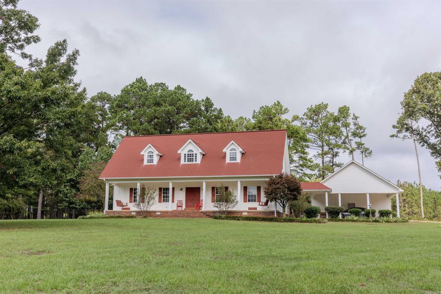 If you’ve been dreaming of a picture-perfect farmhouse, don’t miss this stunning home tucked away on 20 unrestricted acres! From the moment you turn down the driveway, you’ll feel the “ahh” factor. A stocked pond greets you right out front — the perfect spot to watch deer wander in for acorns and a drink of water.  This slice of country paradise offers 3 bedrooms, 2.5 bathrooms, and scenic views from every window + a storm shelter! There’s a level pad ready for your next project — whether that’s a shop, RV parking, or a guest cottage. It already has electricity, water and septic in place, ready to hook up!  The home features gas hookups throughout, allowing you to connect gas furnaces for backup heat during power outages (stored in the attic). Two HVAC units, only 3 and 5 years old, keep the home comfortable year-round and the extra insulation keeps bills low.  Enjoy peaceful country living with the convenience of being just 30 minutes from Monticello. Whether you’re looking to start your homestead or simply escape the hustle and bustle, this property checks every box.  The seller also has access to the adjoining acreage for a deer lease and can share more details if interested!