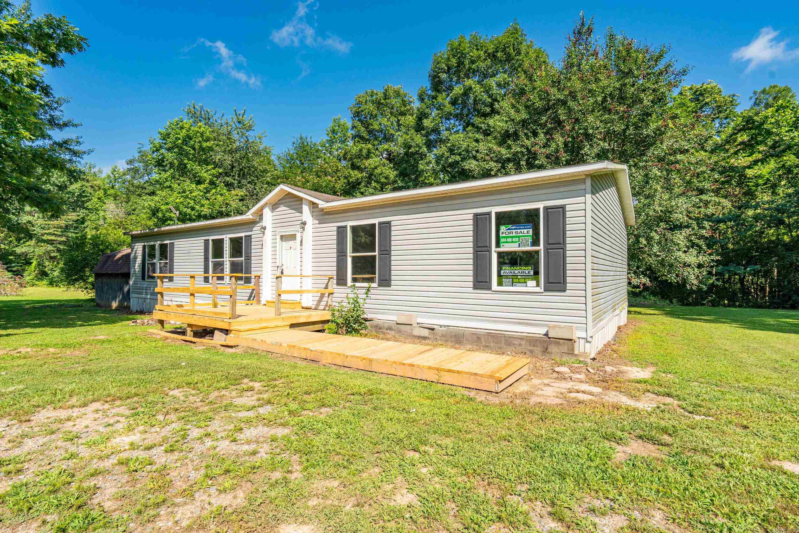 Charming 3 Bedroom, 2 Bath Home on Level Lot This well-maintained home offers comfort and convenience with several recent updates throughout. Step onto the brand-new front deck and walkway, perfect for relaxing evenings or morning coffee. Inside, you'll find fresh carpet and linoleum flooring in the den and living room, providing a cozy and clean feel. The kitchen features an electric stove and refrigerator. While there is no dishwasher, the layout offers plenty of space for meal prep and storage. The home boasts three spacious bedrooms and two full bathrooms, including a garden tub and separate shower in the primary suite. New back steps lead to the level backyard, ideal for outdoor enjoyment or potential garden space. Whether you're a first-time buyer or looking to downsize, this move-in-ready home checks all the boxes.