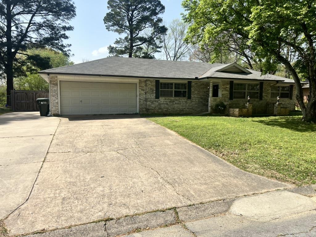 Great Investment Opportunity Near UCA! This 4-bedroom, 2-bath home is in a prime location, perfect for investors or homeowners. It features durable tile and concrete flooring throughout, tiled walk-in showers, a new outdoor AC unit (2023), and an extra-large parking pad for plenty of parking space. Don’t miss this opportunity! Agents, see remarks.