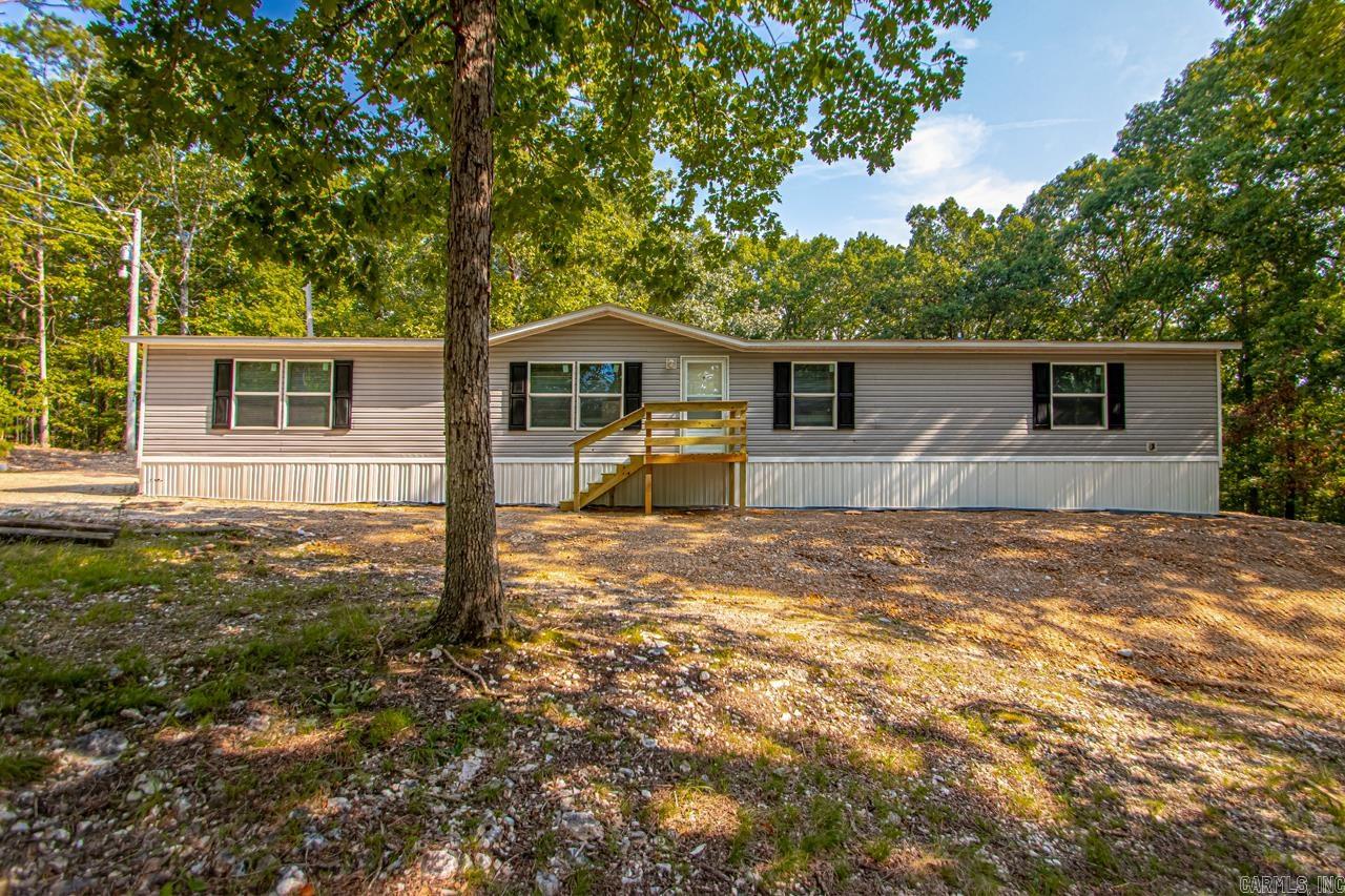 This 2018 manufactured home is situated on a permanent foundation and offers comfort, space, and privacy. Featuring a split floor plan, the home includes 4 spacious bedrooms, 2 full bathrooms, and a brand-new HVAC system for year-round comfort. Enjoy relaxing or entertaining outdoors with a newly built front porch and back deckāideal for taking in the peaceful surroundings. Nestled on a generous 3-acre lot, this property offers endless potential both inside and out.