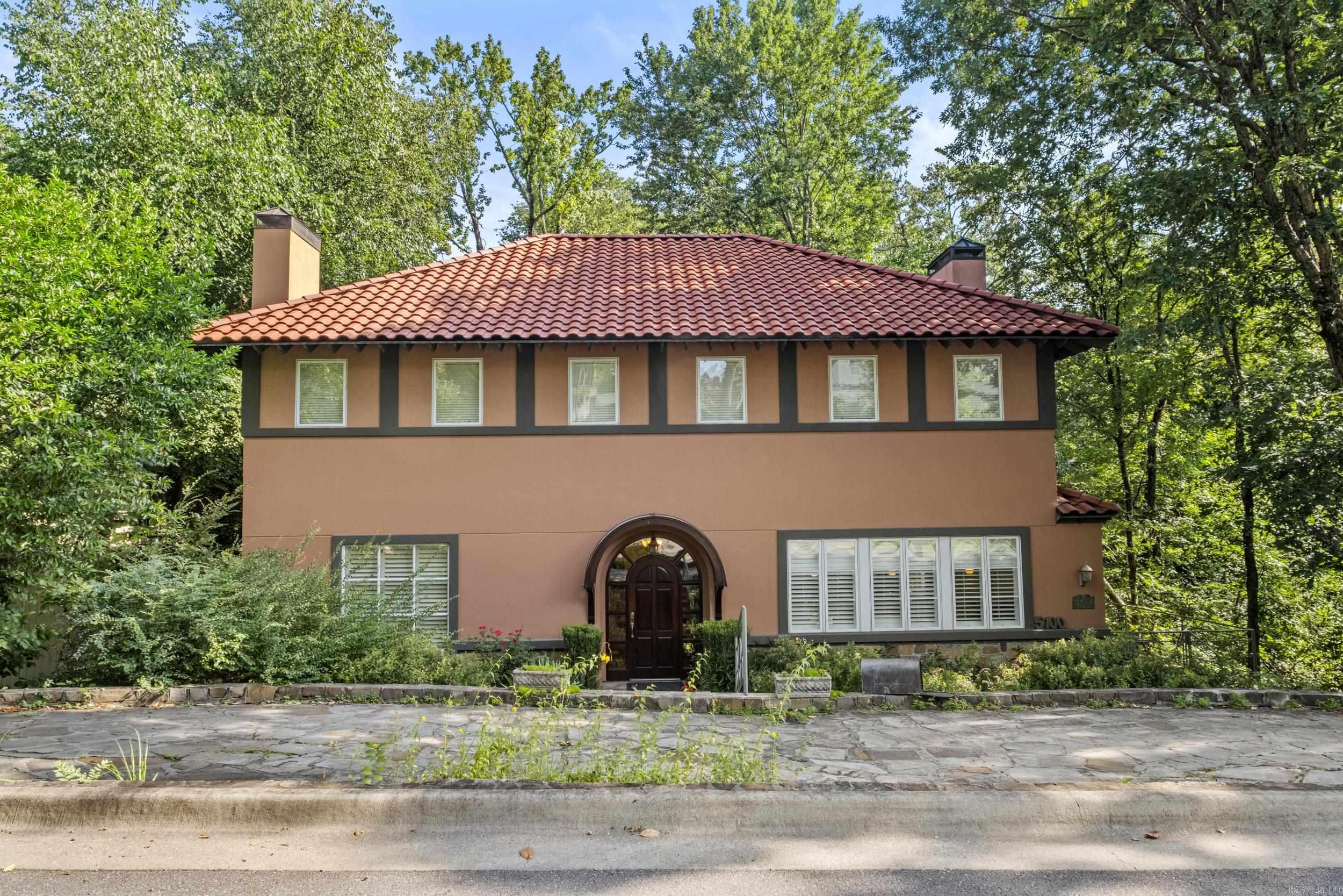 Step into timeless elegance in this stunning Italian-style home nestled in the heart of Little Rock's exclusive Heights neighborhood! Spanning 4296 square feet this 4 bedroom, 4 1/2 bath custom built home offers refined living with unmatched charm! Gorgeous hardwood floors flow throughout the main level, where an open-concept kitchen & den create the perfect space for entertaining! Enjoy the privacy of a tree-lined backyard retreat, ideal for relaxing or hosting gatherings! Downstairs features a fourth bedroom and bath a spacious workout room, gameroom & one of two convenient laundry rooms with the second located on the upper level for added functionality! Minutes from top-tier hospitals, fine dining, boutique shopping and everything the Heights has to offer!!