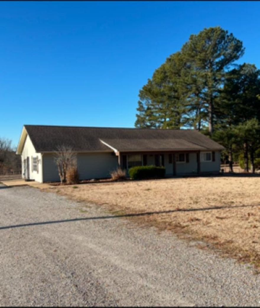 This is a newly remodeled 2 bedroom 2 bath house that sits on 12.6 acres with a large walk in closet, office space and a sunroom. It has a natural gas generator and storm cellar. In the beautiful back yard there is a 36x72 barn with 5 horse stalls. The barn also has an apartment in it. Right behind the barn is 150x300 arena that has steel pipe around it. There is also a turn back alley and chute for calves. To the east of the house there are 4 RV hookups that have water, electric and sewer hook ups.