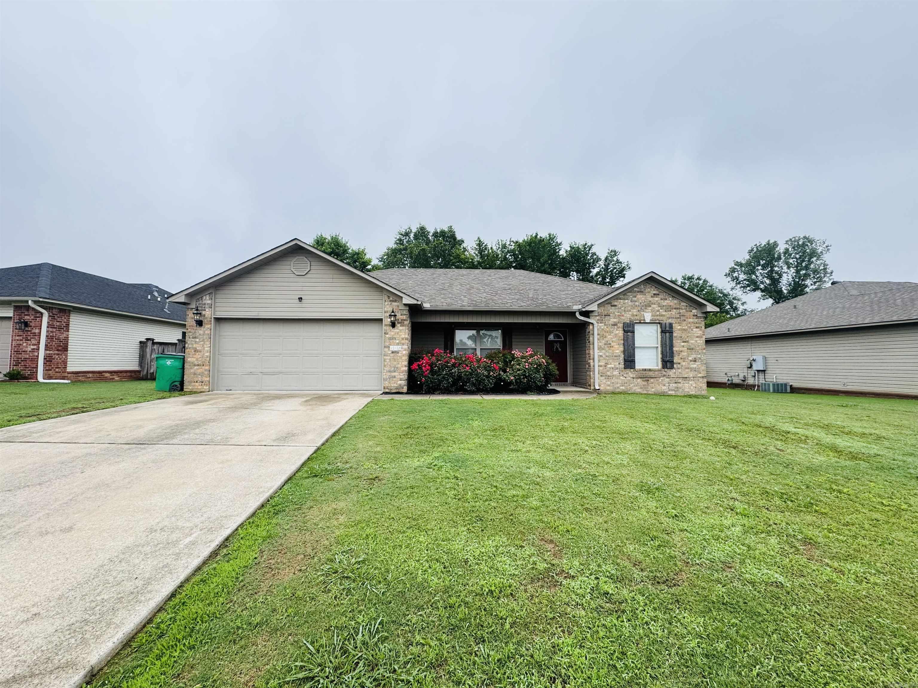 Welcome to 112 Seminole Circle, a well maintained home located in the desirable Quapaw Estates subdivision of Austin, Arkansas! As you walk up to the front door you can't help but to stop and smell the roses... Upon entering, you are welcomed with an oversized family room, with fire place as center of attention. Double tray ceilings give extra height to make the area feel spacious and welcoming. The master is apart from the other two bedrooms and has walk in closet just off the master bath. Kitchen is open to the den with all appliances conveying with the sale. Stepping out of the kitchen leads off to the back deck with fenced in back yard giving you privacy as you are enjoying your fire pit! Roof replaced within the past five years and home is move in ready!! Schedule your showing today, because this one wont last long!!