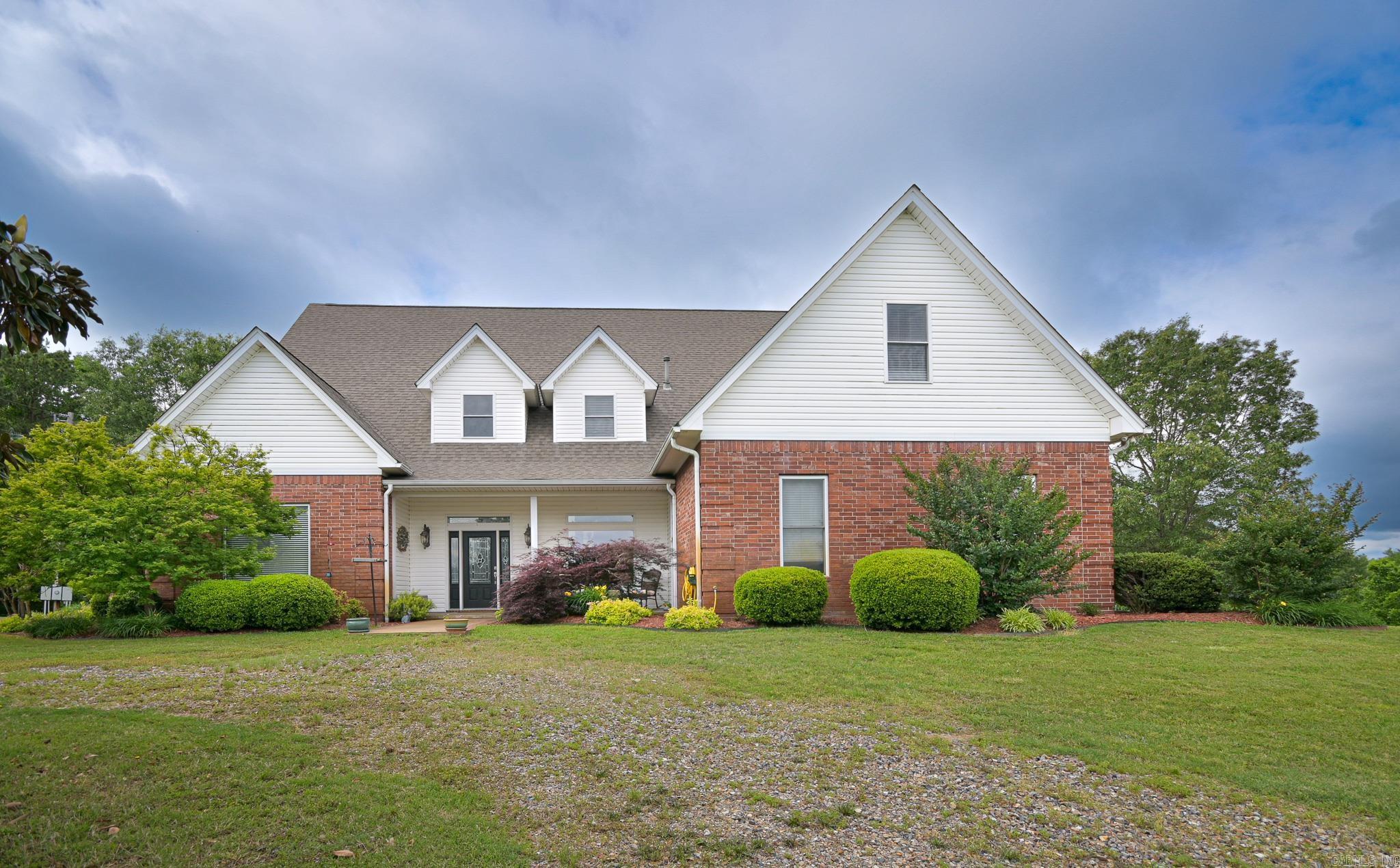 4-Bed, 4-Bath Home on 18.7 Acres with Barn, Pond & Major Updates! Enjoy privacy, space, and modern updates in this 3,512 sq ft, 4-bed, 4-bath home on 18.7 beautiful acres. Features include new hickory engineered flooring, new insulated windows, updated appliances, central heat/air, and a 2,000 sq ft Trex deck. Spacious layout includes a game room with wet bars, bonus storage room, and an office (or 5th bedroom). Outside: a pond, 3-stall horse barn with electricity, shop, storm shelter, 11-zone sprinkler, and hot tub hookups. Long driveway, new well, and plenty of storage throughout. A turnkey country retreat!