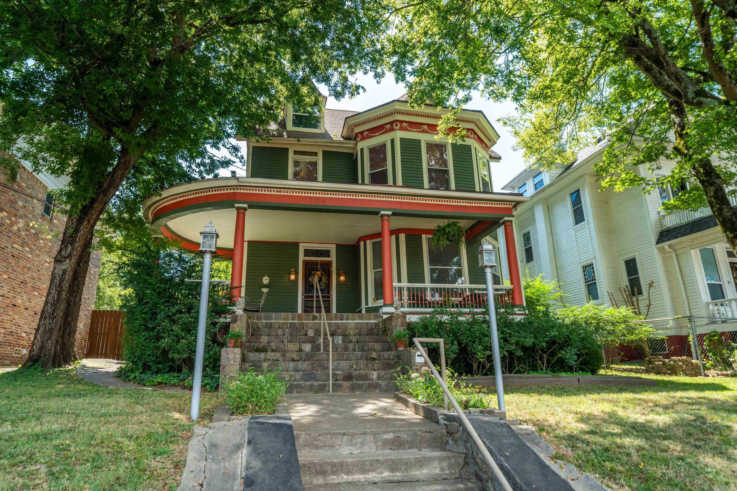 Step into the timeless elegance, a historic gem in the heart of Hot Springs. This beautifully preserved 4-bedroom, 3.5-bathroom home boasts stunning original features, including crown moldings, hardwood floors, and tall ceilings. The grand kitchen and spacious bedrooms, including a main bedroom with an attached study, exude classic charm. Relax in the beautiful glass sunroom or on the expansive front porch, surrounded by the natural beauty of the state. Located in the historic district, this property is a rare find for those seeking a piece of history. And with everything you need already in place, this turn-key property comes fully furnished, making it the perfect opportunity for investors or new homeowners. With a transferable short-term rental license, it's also an attractive investment opportunity for those looking to capitalize on Hot Springs' rich heritage and tourism industry.