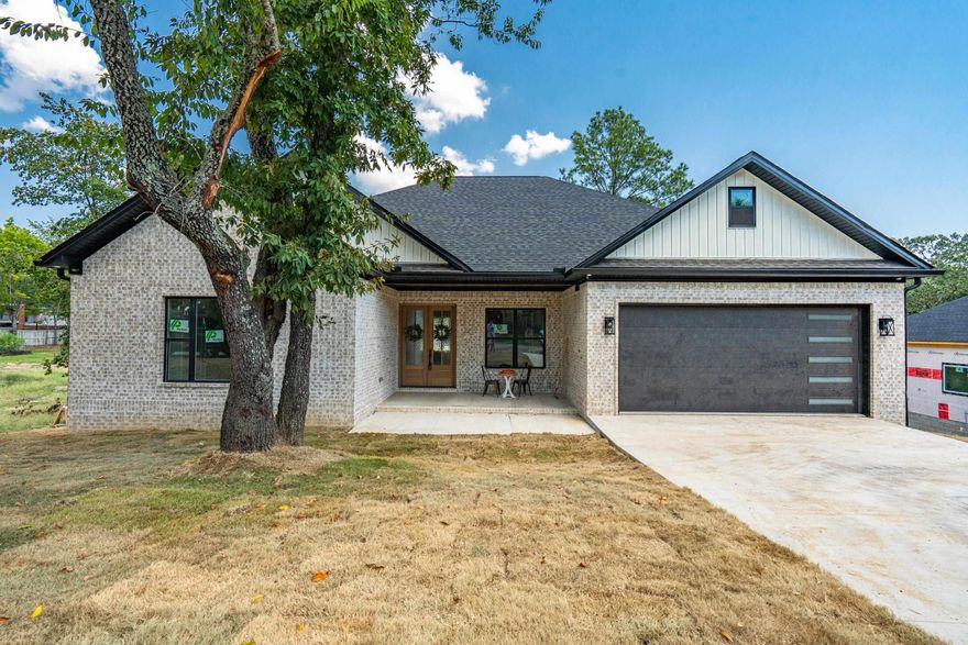 Brand New Construction in The Hills Subdivision! 3 Bed-2 !/2 Bath-Open Floor Plan-Front and Back Porches. Experience elevated living in this beautifully crafted new home nestled in The Hills Subdivision. This 3 bedroom 2 1/2 bathroom residence features an open floor plan designed for modern lifestyles and effortless entertaining. Step inside to find upscale finishes throughout, including high end flooring, custom cabinetry, and designer lighting. The spacious kitchen flows seamlessly into the living and dining areas, making it the heart of the home. enjoy peaceful mornings on the welcoming front porch and unwind in the evenings on the covered back porch. This home features a perfect blend of style, comfort and quality craftmanship. Don't miss your chance to be a part of The Hills!