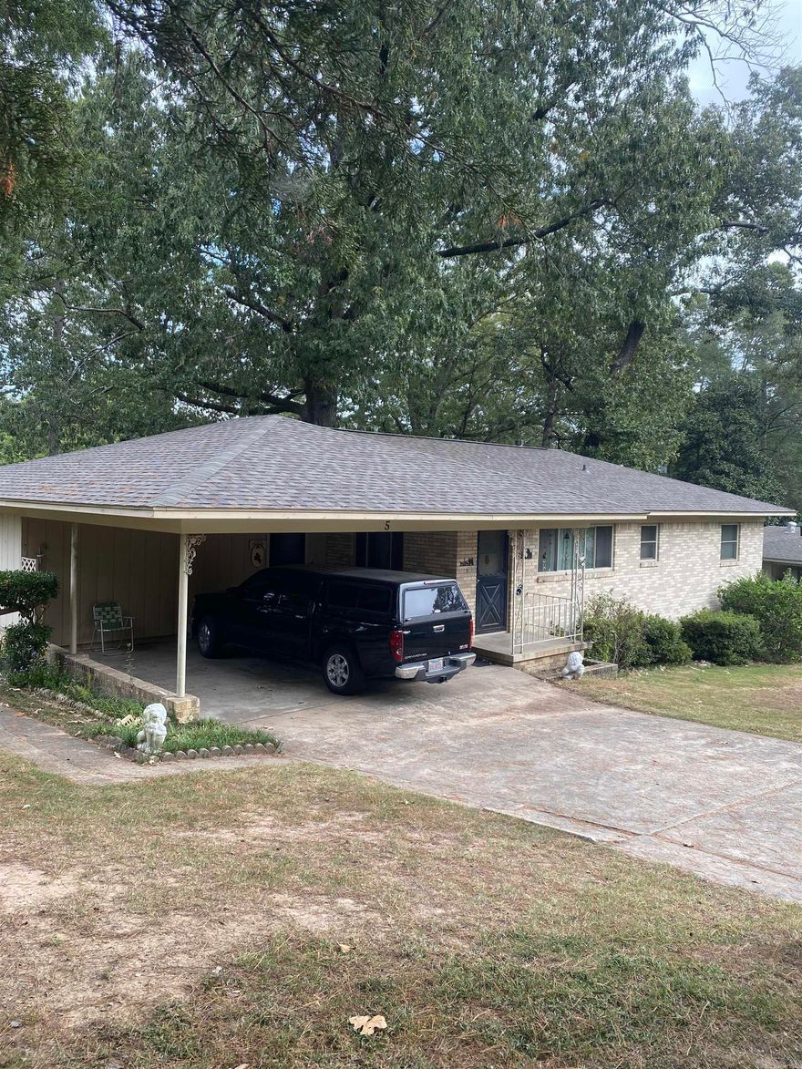 Cozy one level home with a brand new shop and a fenced in back yard. The shop has guttering, great electricity set up, insulation, & a huge covered patio. The home comes with a nice sunroom about 256 sqft. that is NOT included the the sq. ft of the home per tax records of 1434 sq ft.  Home comes with updated windows. There is extra storage space under the back of the home.  This home has a brand new architectural roof, with a 2 carport. Great neighborhood.  Easy access to I-430.