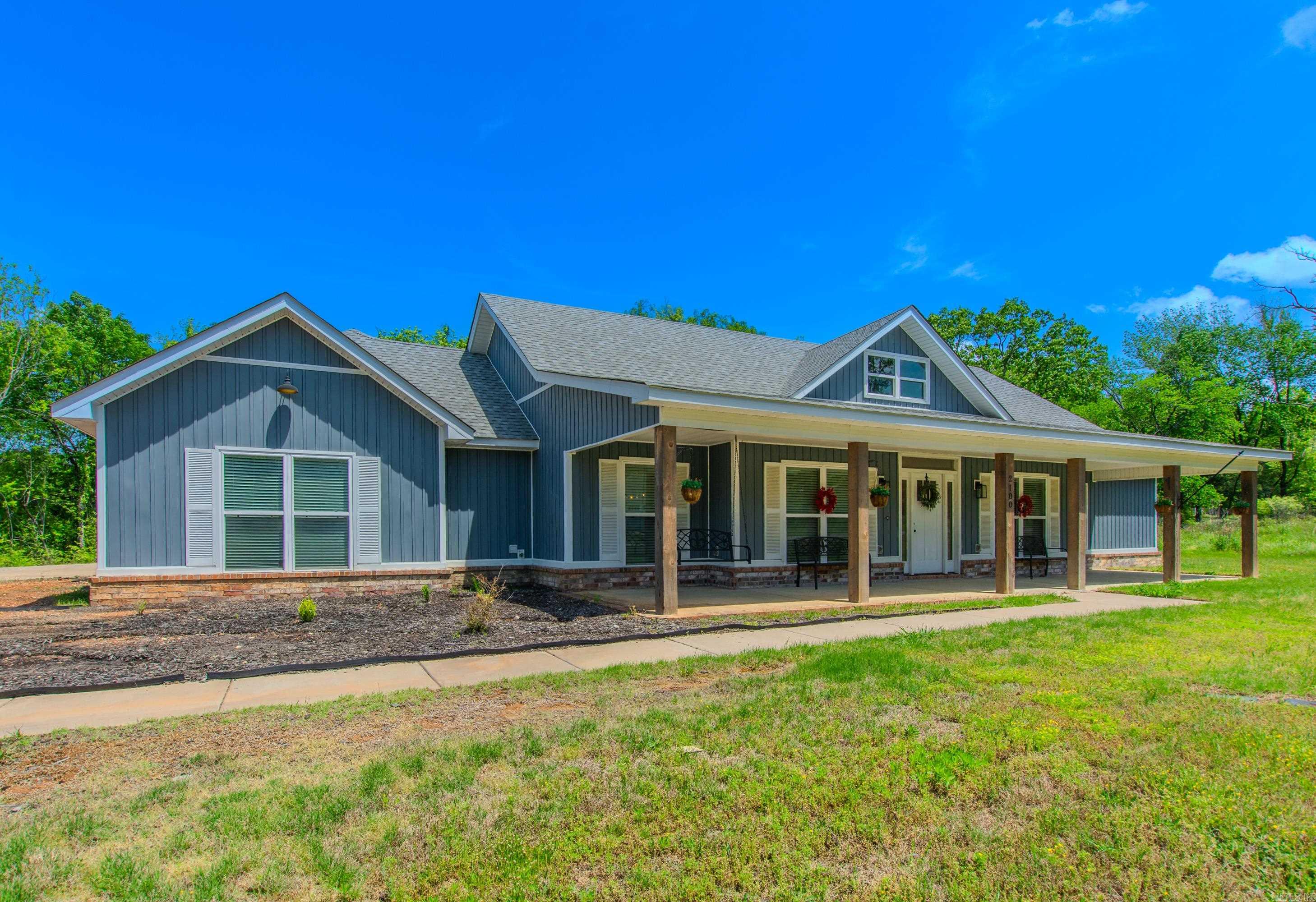 Welcome to your dream home! Nestled on a generous 1.42-acre lot, this beautifully designed 4-bedroom, 2.5-bath home offers the perfect blend of space, comfort, and modern living. The open concept layout creates a bright and airy atmosphere, ideal for both everyday living and entertaining. Enjoy the privacy and functionality of a split floor plan, with the primary suite thoughtfully separated from the additional bedrooms and an office space at the front of home. The spacious kitchen opens into the living and dining areas, making it easy to stay connected with family and guests. Step outside to take in the peace and privacy of the expansive lotāplenty of room for a garden, or outdoor entertaining space. With room to roam and stylish interiors, this home is a rare find that combines country charm with contemporary features. Welcome home to 2100 Ferndale Cove!