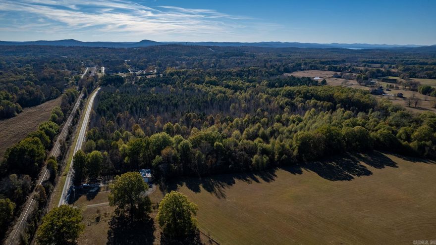 Enjoy the quiet countryside, out of the hustle and bustle of the city, but only minutes from Hwy 10 and Chenal. 64 acres in West Pulaski County ready for a new home or recreational activities.  This listing includes a total of 59 acres including Lots 2, 3, 4, 5, 6 and Tract 5 of Roland Woods.  For more information please see agent remarks or contact agent at 501-837-5159