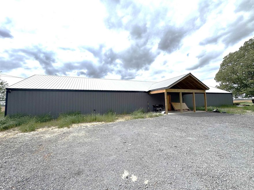 Escape to a sportsman's retreat with this fully furnished duck club, perfectly set up for comfort, convenience and unforgettable hunting seasons.  This spacious property features 10 bedrooms, 2 full baths and 2 half baths (one with washer/dryer).  At the heart of the home, you'll find a well-equipped kitchen that opens seamlessly into a generous dining and 2 living areas, creating the perfect space to gather, relax and share stories.  A cozy corner fireplace adds warmth and charm. Other features include a tankless water heater, gas logs (in box),2-3 ton ac units, spray foam roof deck, 2x6 exterior walls.  Step outside to a small back porch with water access--perfect for cleaning gear or game.  The approximately 1/2-acre lot includes a gravel parking area,  offering easy access and plenty of room for vehicles, boats and trailers.  Where you are looking for a turnkey lodge or private getaway, this property is ready to go.