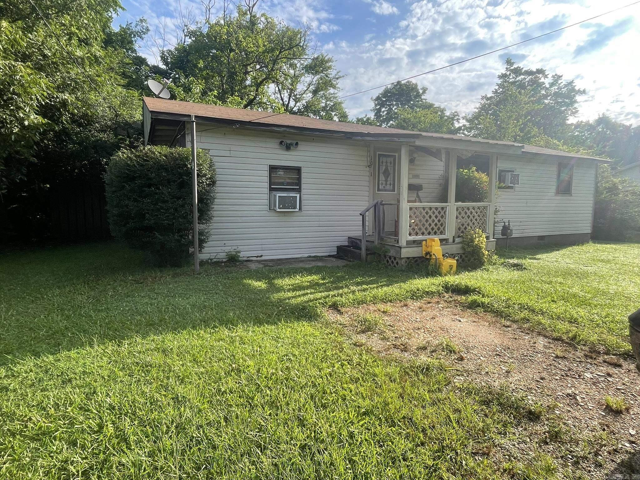 Nestled in the heart of Mena, AR, and located just minutes from local amenities. This home offers the best of small town living. Don't miss out on this one of a kind property! 3 bedroom, 2 bath, CHA, all city utilities and priced to sell!