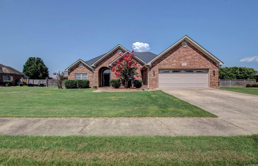 Welcome to 3 Abbie in Vilonia—a beautiful home offering space, versatility, and fantastic features inside and out! FRESH PAINT throughout makes this home feel bright and refreshed. The living room features a cozy corner fireplace and large windows, while the layout includes both a separate formal dining room and an eat-in kitchen with a breakfast area—perfect for gatherings. The primary suite offers a relaxing escape with an oversized jetted tub, stand-up shower, double vanities, and a spacious walk-in closet. Large bedrooms provide plenty of space for everyone. Concrete flooring ensures easy upkeep, and there’s an above-ground storm shelter for peace of mind. Enjoy an extra-large backyard with a wood privacy fence, a huge SCREENED-IN PORCH, and raised garden beds ready for planting. The impressive 15x40 INSULATED SHOP comes equipped with two window units and electric service—ideal for projects, hobbies, or storage.Qualifies for 100% financing with Rural Development—don’t miss this fantastic opportunity!