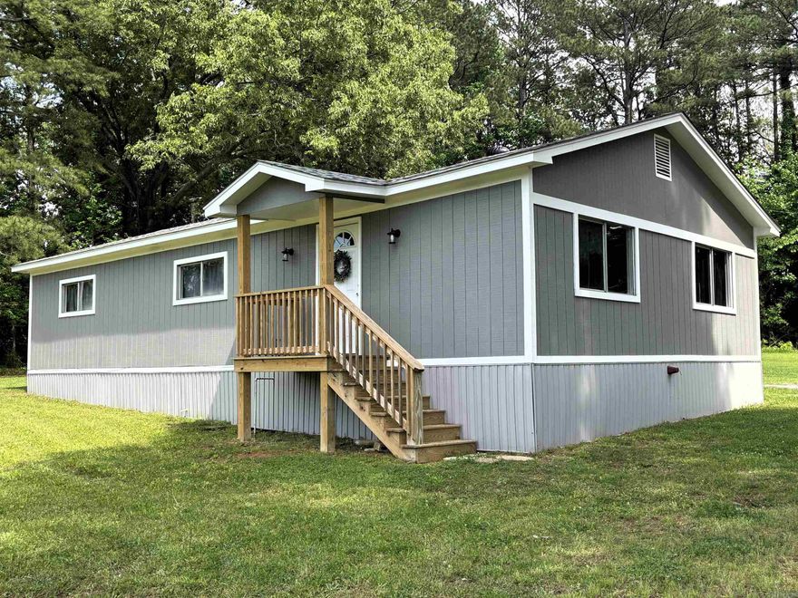 Beautifully renovated home in a great location—perfect for a family! The owner has taken this property down to the studs and completely transformed it with quality upgrades throughout. Age of trailer is unknown, but it was entirely redone in 2025.   Features include new plumbing, roof, HVAC system, electrical, LVP flooring, cabinets, and more. This home is truly move-in ready and offers a spacious yard with room for a garden. No restrictions provide added flexibility.  The home is all-electric, with natural gas available if desired.  Important: This property does not qualify for traditional 30-year financing options such as VA, FHA, or RD loans. Buyers should plan for cash purchase or a substantial down payment.