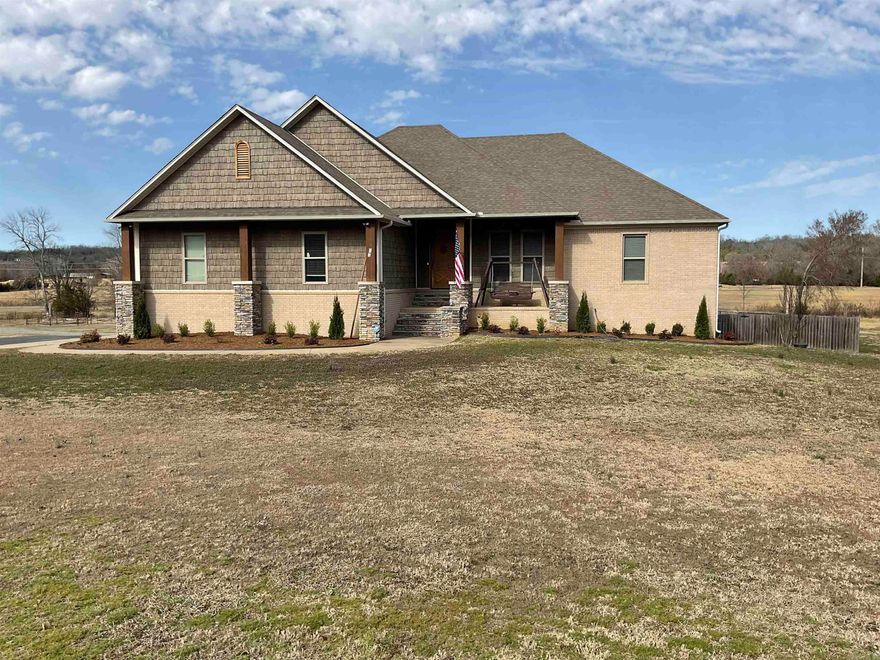 Experience luxury country living on 26.84 fully fenced acres with a several ponds and barn, perfect for livestock or hobby farming.   This beautiful 3-bedroom home features 4 full baths plus a half bath by the pool area. The main level offers a spacious kitchen with abundant storage, ideal for entertaining. Downstairs includes a full second kitchen, a flexible room for a bedroom, and a full bath—perfect for guests or multi-generational living.  Enjoy your private outdoor retreat with an oversized pool and multiple covered entertaining areas, all surrounded by peaceful acreage.  Recent updates include: new pool liner (2023), ice maker (2025), upstairs appliances (2025), downstairs appliances (2025), elevator battery (2024), added ceiling fans, new shop window, and barn repaint (2023).  24-hour notice required for showings.