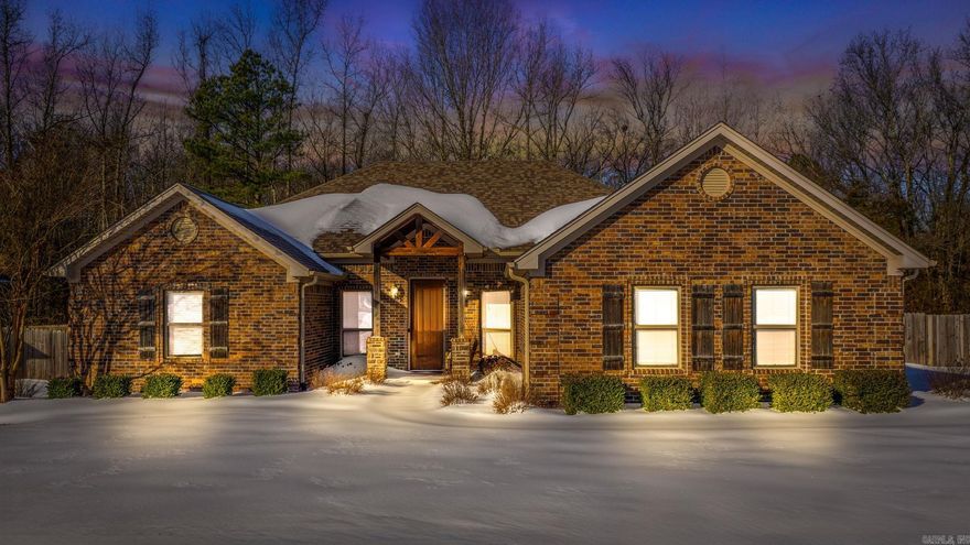 This charming 4-bedroom, 2-bathroom home located in Austin, AR. Convenient location just 5 minutes from Cabot, 15 minutes to the Airbase, and 35 minutes from Little Rock. Open Concept living room with built ins and a gas fireplace. A spacious kitchen that has ample counter space and a large breakfast bar. The split floor plan features a private primary suite with a tray ceiling, 2 Walk in closets, a soaking tub, separate walk in shower, and private water closet. The oversized covered patio has a peaceful and private feel that overlooks your large flat backyard and enjoys the added benefit of backing up to the wooded green space. The large storage shed conveys.