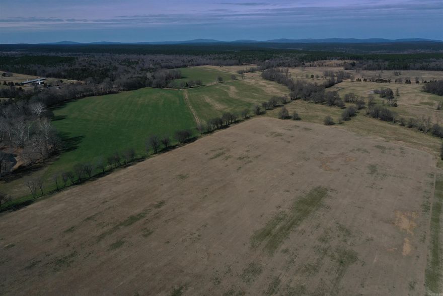 Located in the heart of the Ouachita Mountains, in beautiful Scott County, Arkansas, this 608 +/- acre working cattle ranch is the ultimate blend of productivity and functionality. The ranch has been meticulously maintained under the care of a USDA expert for years, and it is easy to see in every direction that you look. Not only is this a top notch cattle farm, but also a great recreational property as well. With over 1.5 miles of Ouachita National Forest Boundary, and just under one mile of frontage on the Clear Fork River, the outdoor opportunities are endless.608 +/- Acre Ranch in the heart of the Ouachita’s Meticulously maintained for cattle and hay production Excellent Cattle working facilities Frontage on the Clear Fork River Ouachita National Forest Boundary 1410 +/- Sq.Ft. two story Home with phenomenal mountain views Pipe Corral with multiple traps, pens, and load out Pipe round pen Excellent Fencing and cross fencing Over 1.5 miles of pipe rail and stainless cable fencing Currently utilizing rotational grazing for their herd Impeccable pasture and forage across the entire farm Improved Bermuda grass hay meadows Covered arena will be removed and does not convey