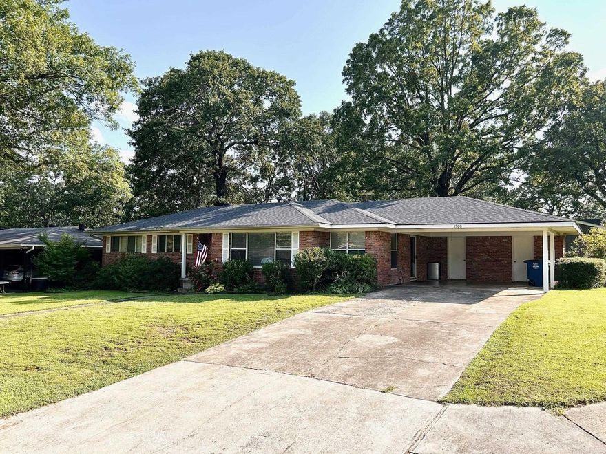 Charming One Level Brick Home on Corner Lot near Crestwood Elementary School. Features 3 BR 2BA multiple living areas.  Large Formal Living -Dining - Open Den and combination of large windows and sliding glass doors offers beautiful natural light to the back yard and covered patio. Kitchen /Den combo with breakfast bar and built in desk. Oversized wide hallway!  Fully fenced corner yard. Tile & Laminate flooring, Gas stove, Built in Cabinets, Ceiling fans, granite counters in bath w/ double sinks. Architectural Roof added Sept 2024. New Air added May 2025. Measurements are estimated.