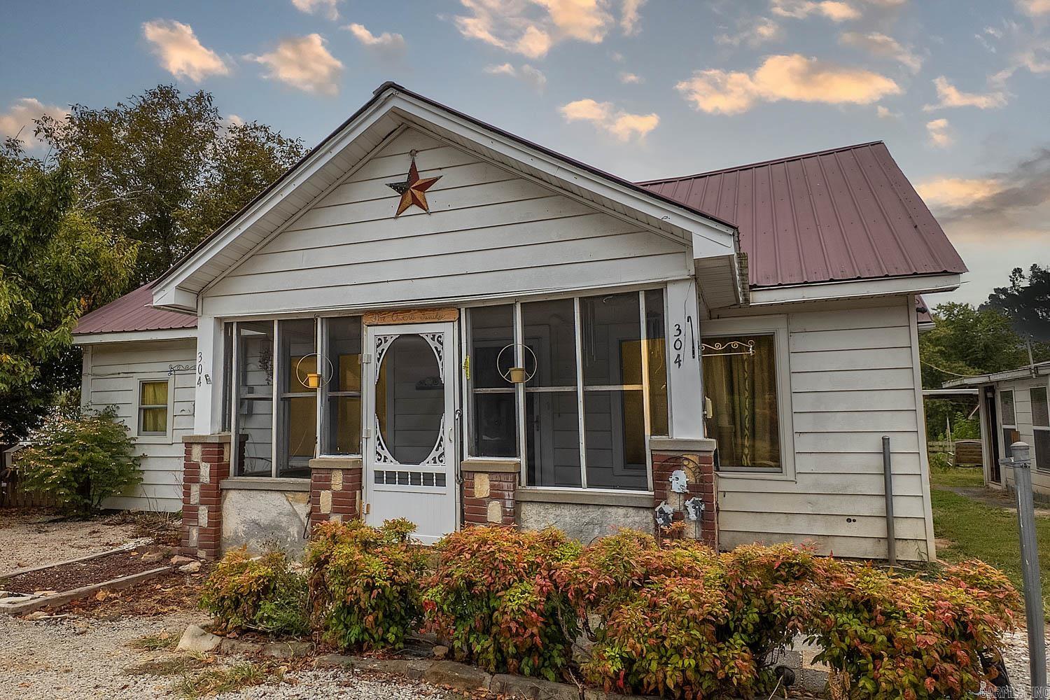 Charming 4-Bedroom Home with Workshop & Garden in Salem, Arkansas This spacious 4-bedroom, 2-bath home is perfectly situated in the heart of Salem, AR, offering both convenience and comfort. Located right beside Town & Country—the area’s top supermarket—you’ll enjoy the ease of walking to groceries and local shops. The property features a gravel driveway with covered parking for one vehicle plus ample guest space. A large, well-maintained garden area is perfect for homegrown produce, while a spacious storm cellar provides security and peace of mind. A 30-amp camper hookup adds versatility for RV hosting or personal use. Inside, recent updates include new energy-efficient windows installed by a professional company out of Little Rock, an updated bathroom, modern appliances, and flexible living spaces. The woodworking shop, equipped with a wall unit and storage shelves, offers the perfect space for projects or small business use. With NEXT fiber optic internet available, you’ll have reliable connectivity for work or streaming. Combining upgraded features, functional amenities, and an unbeatable central location, this property delivers the best of Ozarks living.