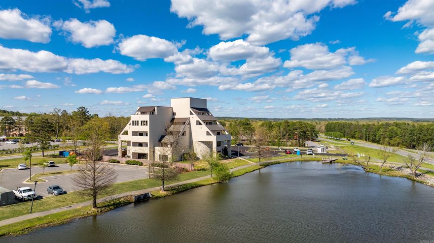 Welcome to this most Iconic Building in Maumelle. This magnificent 3-bedroom, 2-bathroom condominium located in the middle of Maumelle, AR. This residence spans a generous 2500 square feet, boasting an open, spacious layout 3 bedrooms, 2 baths, huge laundry room and an oversized private balcony over looking Lake Valencia! Oversized windows fill every room with abundant natural light, amplifying the charm of its hardwood flooring. Live in the most Iconic Building in Maumelle!!! Recently completely renovated inside and out this building is a staple to Maumelle and living in luxury is what you will receive. For your convenience, the rent includes yard maintenance and trash service, while dedicated parking is available for tenants.  How about calling this charming condo home? Contact us for viewing arrangements and further details. Don't miss the chance to make this coveted space your home - contact us now to experience an unmatched blend of convenience, comfort, and luxury. Step into fine living today!