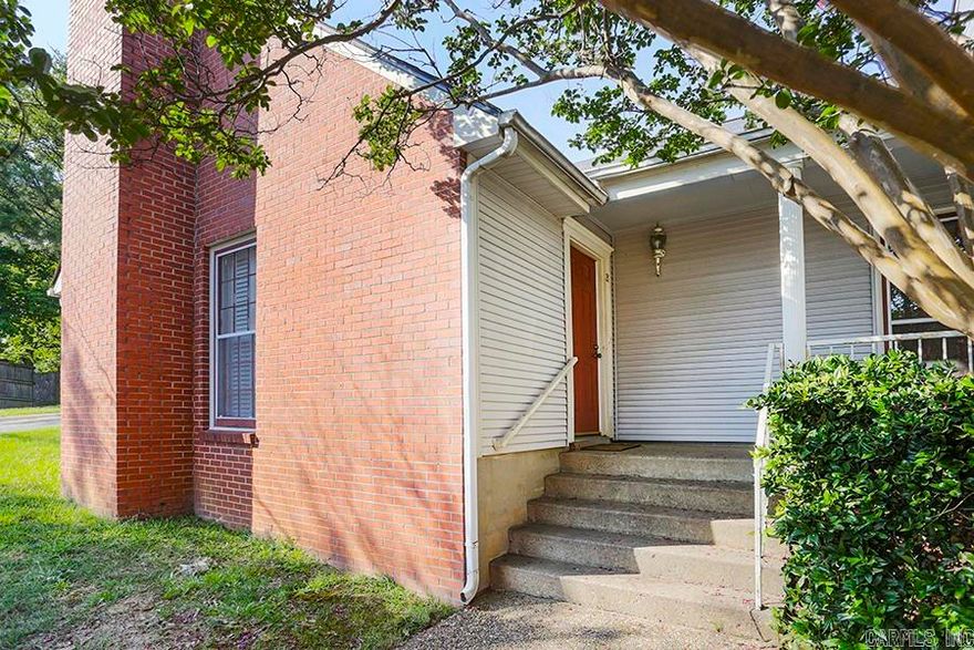 Come see this precious condo at Chimney Cove! There's a lot of charm packed into this tidy space including a welcoming front porch, pretty wood floors, a separate dining area, and a private patio with storage and a maple tree! The primary bedroom is spacious, and the second bedroom has nice built-ins and would be ideal as an office or library when not utilized as a bedroom.  It is in a great midtown location that's close to everything including shopping, schools, and restaurants.  And it offers easy access to downtown, WLR, and UAMS. It is being sold in "As Is" condition with no repairs and is priced accordingly. Agents see remarks.