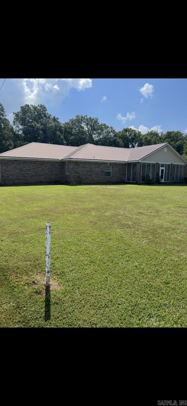 This beautiful property features a 3-4 bedroom, 2.5 bath home sitting on 5 acres. complete with a generator for a peace of mind. The main home offers a functional floor plan perfect for family living or entertaining. Also included is a separate 2-bedroom house that need some TLC but has great potential- ideal for a mother-in-law quarters, guest house, or rental income opportunity. Enjoy the privacy of country living. 24- hour notice required for all showings.