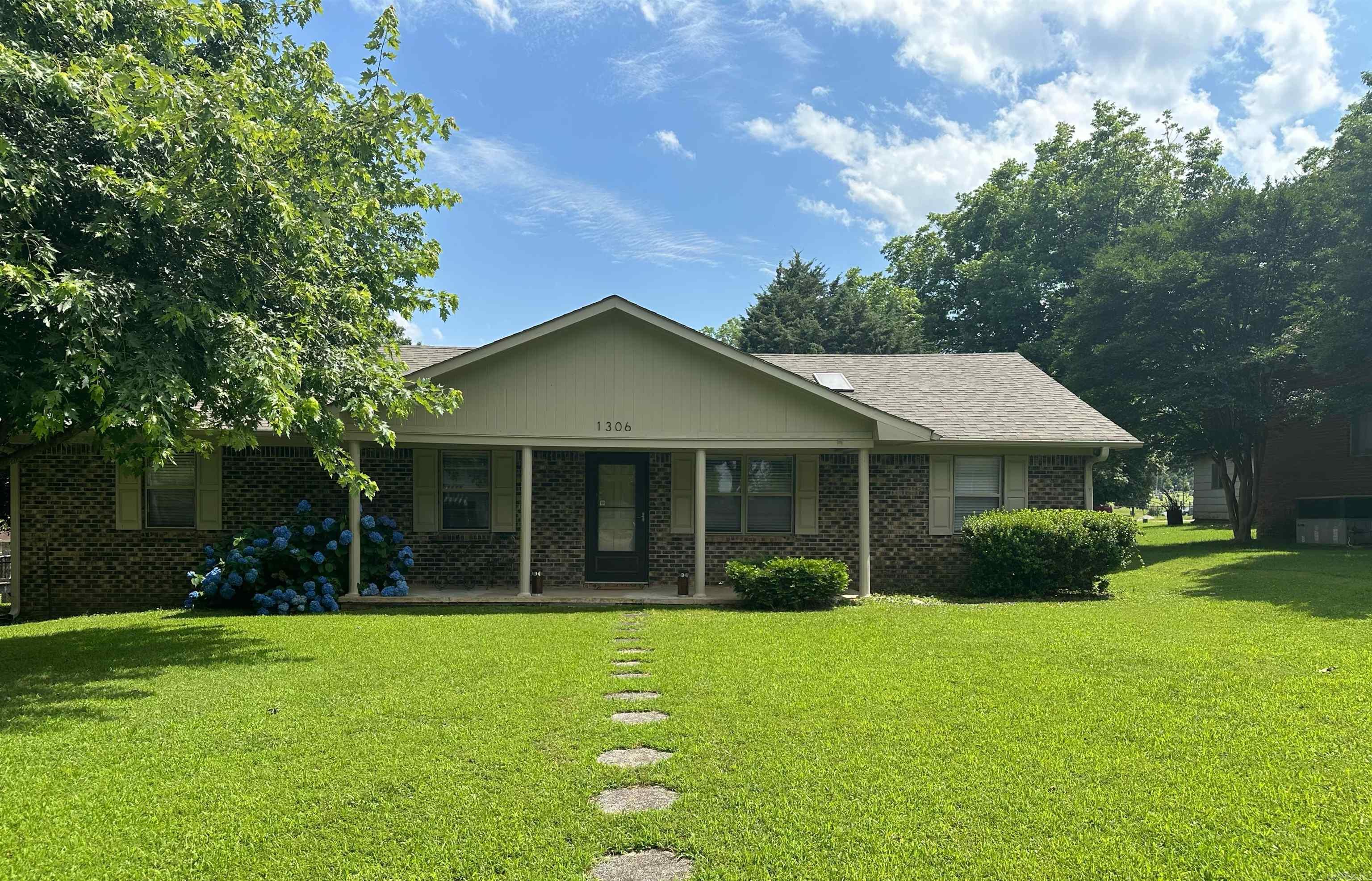 Location, location, location!! This newly renovated house located in the heart of Paragould, offers everything you are looking for and more. It sits on a 0.29 acre double lot accessible from Emerson Street and Main Street. The lot has mature trees and landscaping. Need a place for your dog to run? You will find a 100x16 ft dog run in the back yard, along with a large deck ideal for summer relaxation. Now, come on inside. The expansive living area and den are open to the kitchen. The kitchen is beautifully appointed with white cabinets and is open to the den and living area with all appliances included. Four spacious bedrooms complete the home. Front bedroom has a skylight and a half bath. Closet space is plentiful throughout. The hall bath is fully handicapped accessible with roll in ability for a wheel chair with a large closet. The laundry room is packed with storage shelves and large enough to actually enjoy doing the laundry!! Conveniently located less that 10 minutes from the 8 mile walking trail, fast food establishments, drugstores, churches, hospital, schools, and various businesses. This home is waiting for you!!
