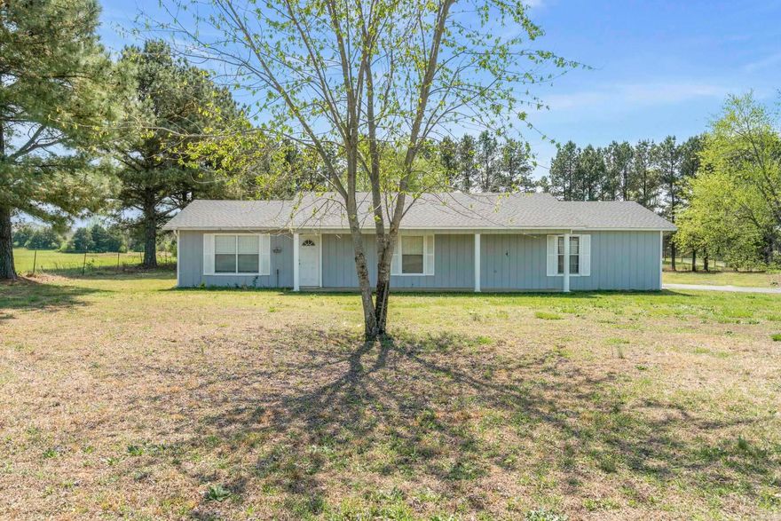 This is a cute home in Rose Bud.  Situtiated on 2  tree lined acres. Front Porch across the front.  Nice covered back porch.  Large primary bedroom with large wakin closet.  This home is a must see.  3o minites to Greers Ferry Lake and the Little Red River.  Not far from Searcy.