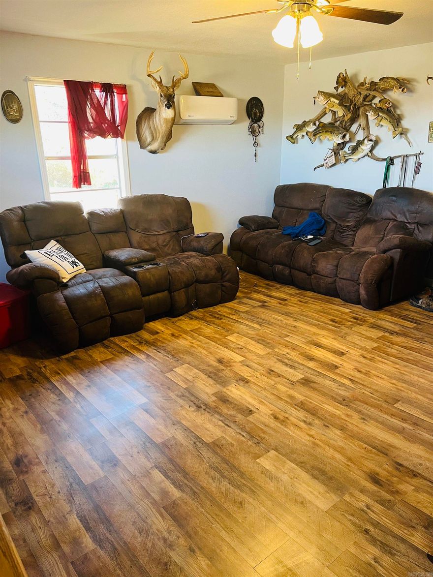 This charming 3 bedroom, 1 bathroom home offers peaceful country living on a 0.90 acre lot with breathtaking scenery. Completely remodeled five years ago, the house boasts modern updates while maintaining a cozy, welcoming atmosphere. The living spaces feature fresh, neutral paint and updated flooring, while the kitchen includes stylish cabinetry and newer appliances. It also offers a tankless water heater and modern inverters for heat and cooling features. Outside, you'll find a spacious yard for gardening, outdoor activities, or simply enjoying the serene views. This property is a perfect retreat for those seeking tranquility without sacrificing convenience.