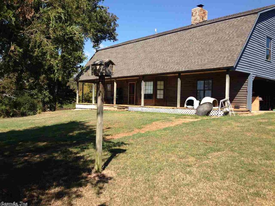 Very secluded home on 5 acres- 2 bedrooms up, 2 bedrooms down; refinished hard wood floors in living room, beautiful wood fireplace, can have horses, bay window in living room, lots of storage in kitchen, New Roof, 14 miles from Conway!  Priced BELOW apprasial!! Property to be surveyed to convey five (5) acres.