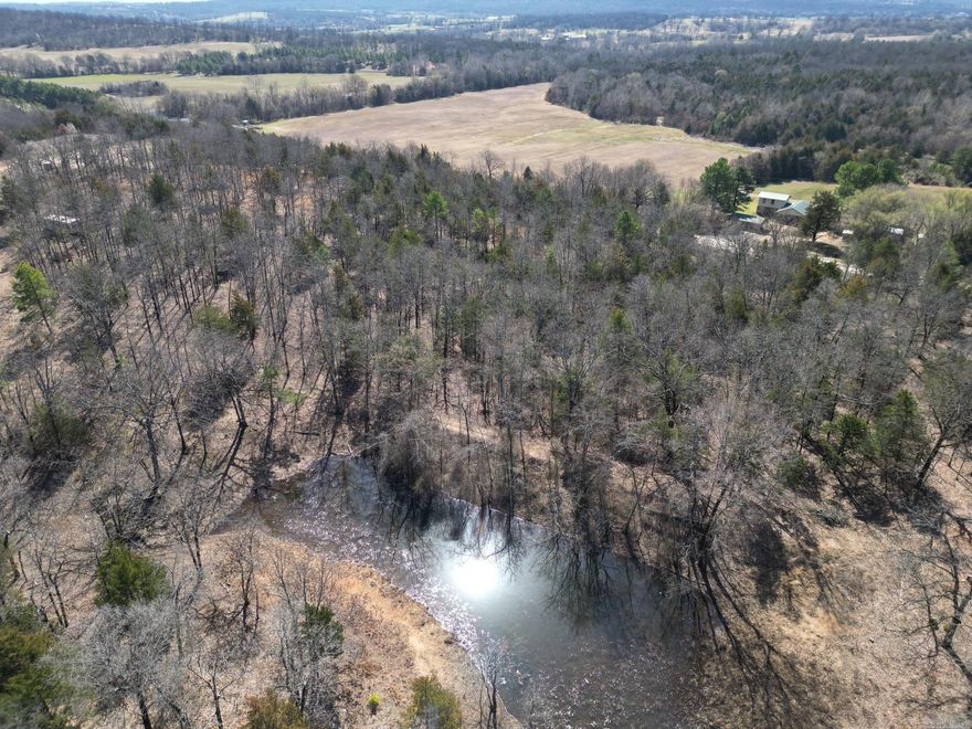 Beautiful 19 acres in Huntington AR with awesome build sites for a home or commercial property right off of Hwy 252.   Backs up to a beautiful lake property with high points for great views of build sites.