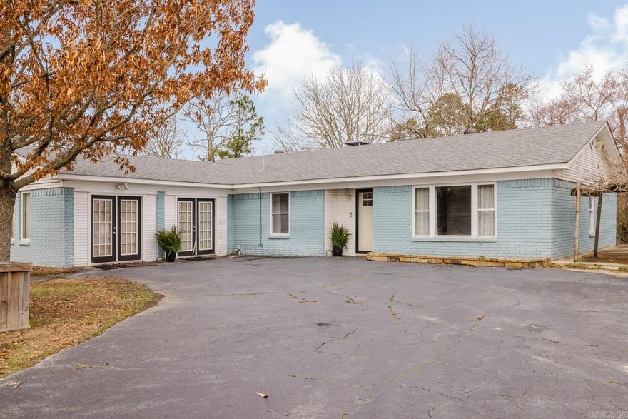 Come home to this 4BR/2BA updated Farm-style home that offers an open floorplan all perched on top of a 1.26 acre lot! The 4th bedroom could serve as a den/bonus. In the kitchen you'll find matching appliances, deep farmhouse sink, and a custom island. (Fridge conveys!) A warm wood-like tile can be found throughout the home as well as decorative lighting. The bathrooms offer floor-to-ceiling custom tiled showers. Warm up by the fire with the wood-burning fireplace on those chilly nights. In the front yard, you can enjoy the lovely in-ground pool on your days off. The property offers a spacious yard that is partially fenced for all your fur babies. Check this one out before it's gone!  *AGENT SEE REMARKS