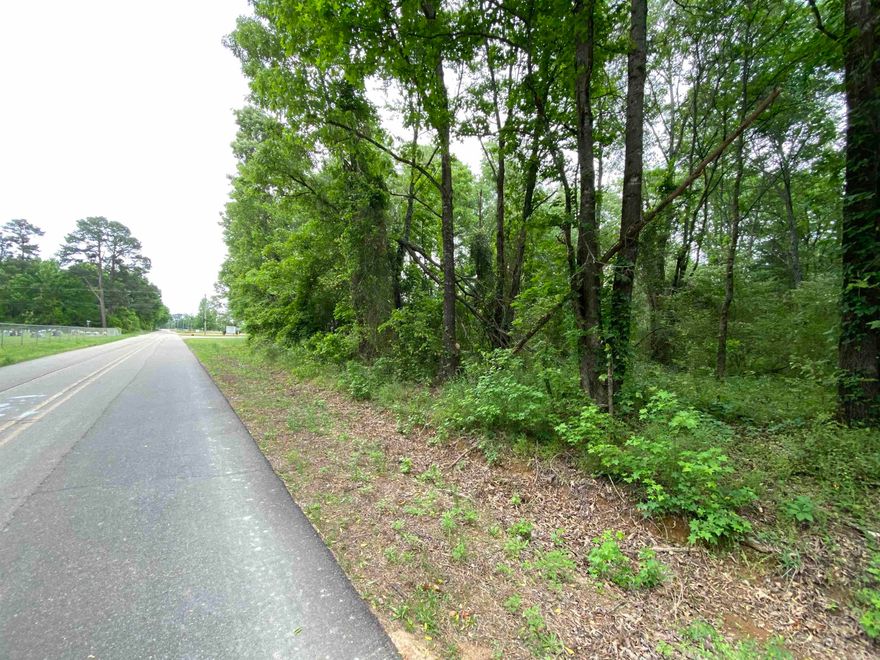 Just minutes from town, this 3.80 acres has Buck Range Road frontage.  Rural water and electricity accessible.  Great building site or two. Contact our office for more details.